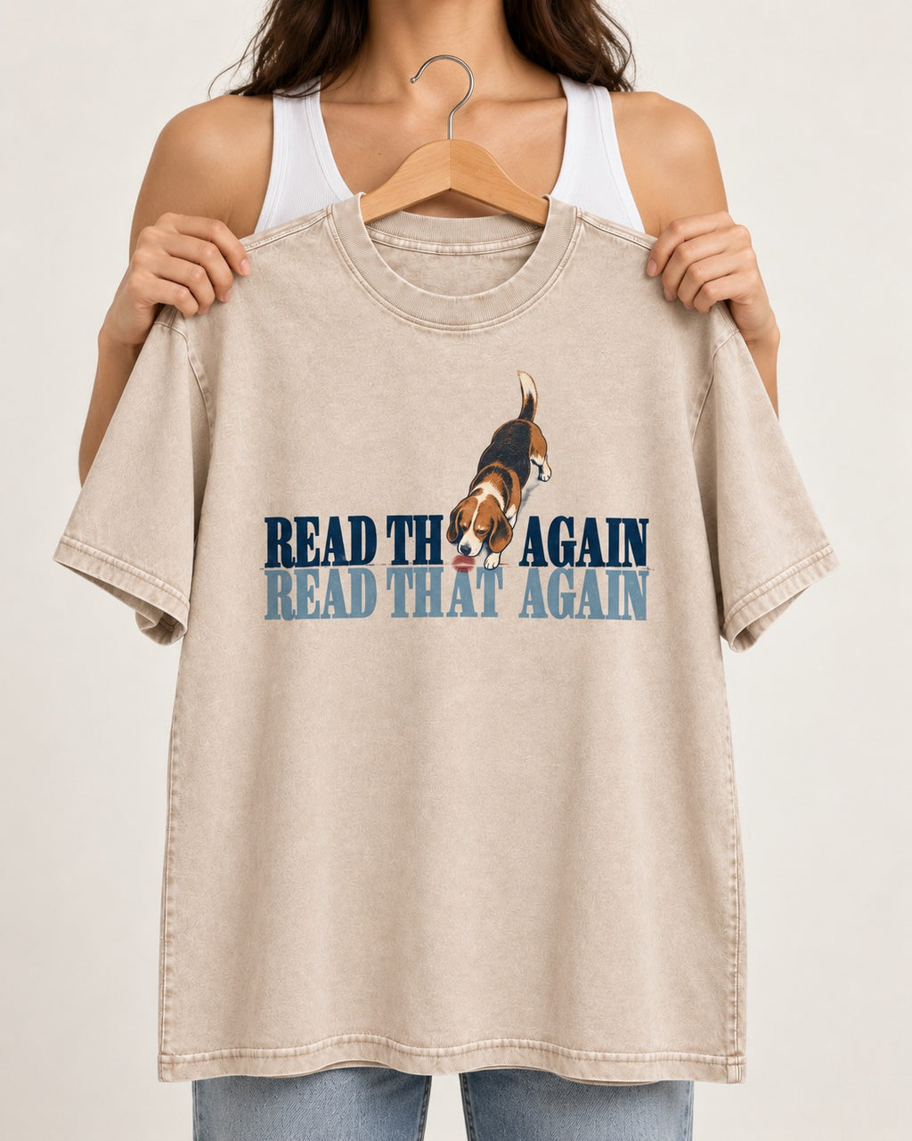 Read That Again Beagle Washed Tee in Apricot, held up on a hanger