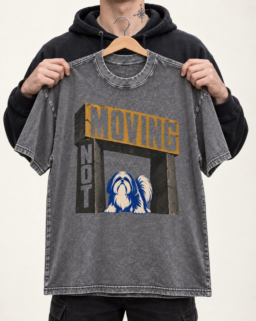 Not Moving Shih Tzu Washed Tee in Gray, held up on a hanger