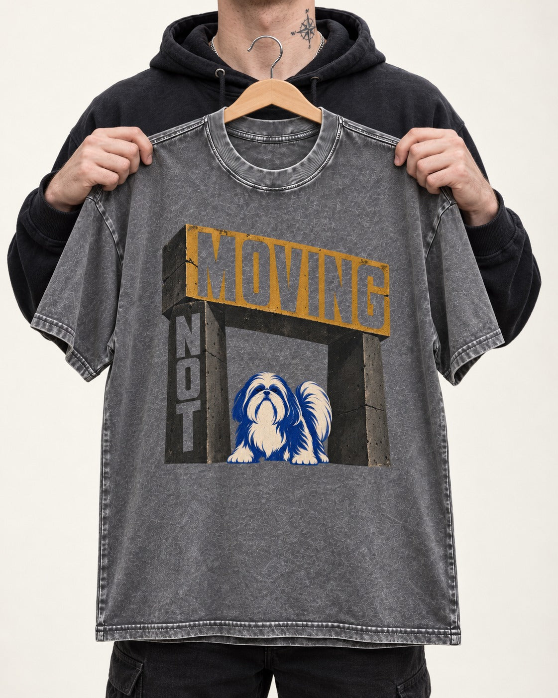 Not Moving Shih Tzu Washed Tee in Gray, held up on a hanger