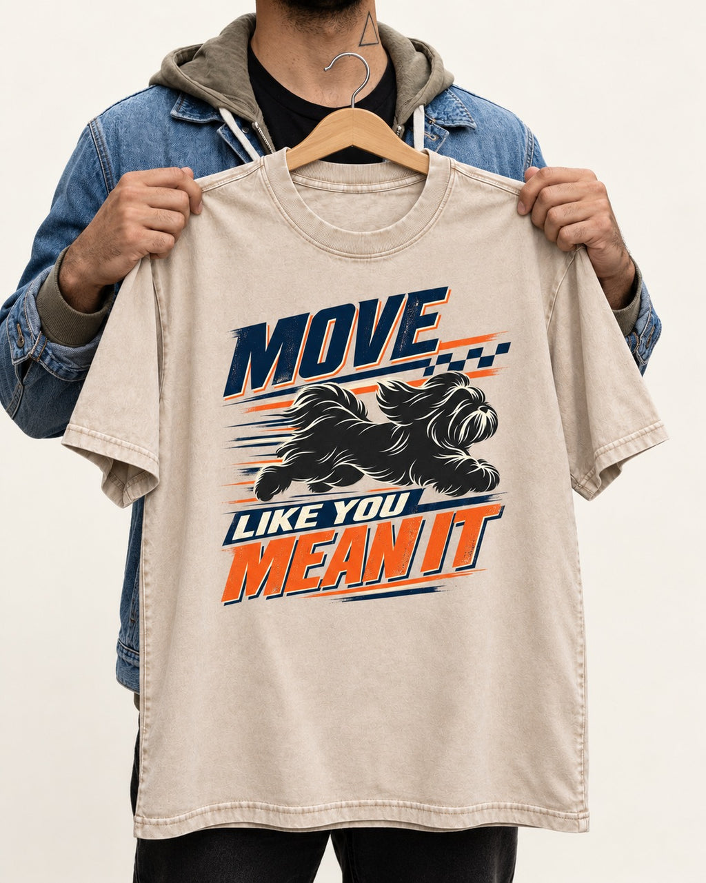 Move and Mean It Shih Tzu Washed Tee in Apricot, held up on a hanger