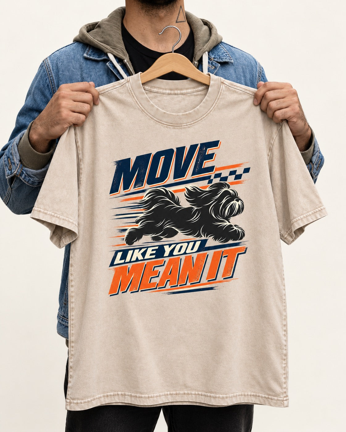Move and Mean It Shih Tzu Washed Tee in Apricot, held up on a hanger