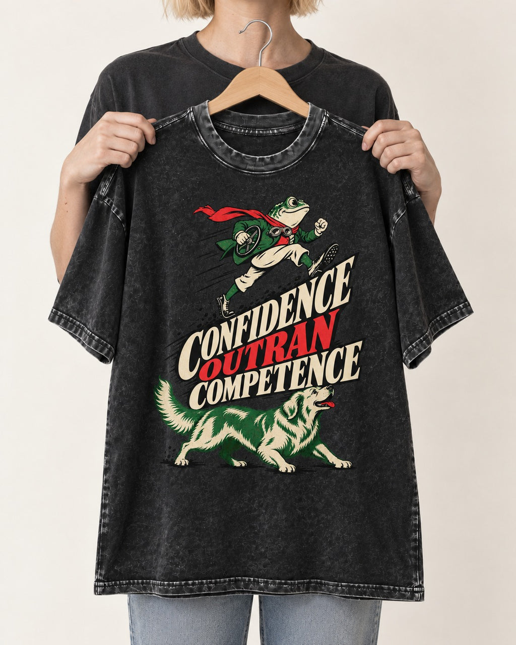 Golden Retriever Confidence Outran Competence Racing Graphic Washed Tee in Black, held up on a hanger