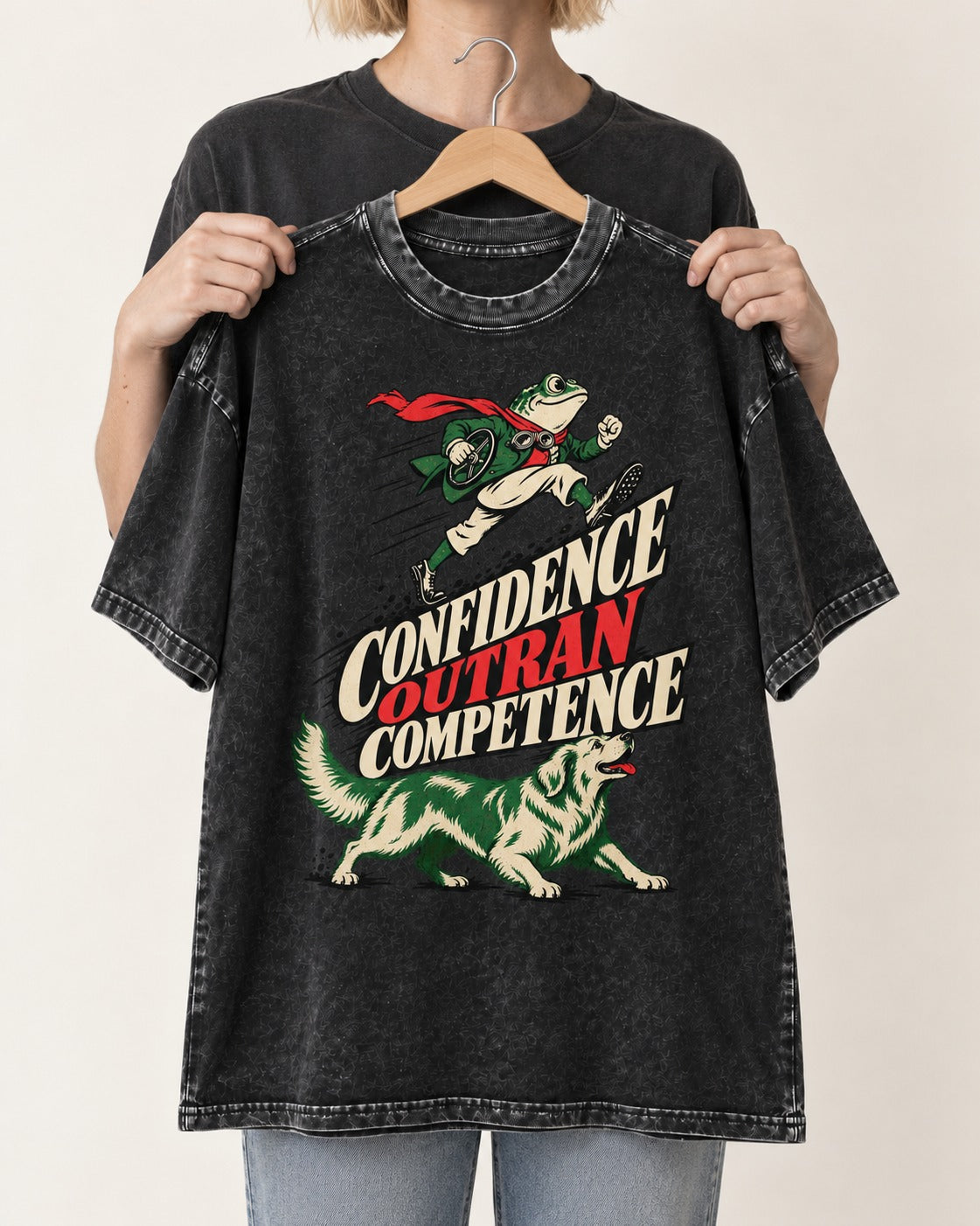 Golden Retriever Confidence Outran Competence Racing Graphic Washed Tee in Black, held up on a hanger