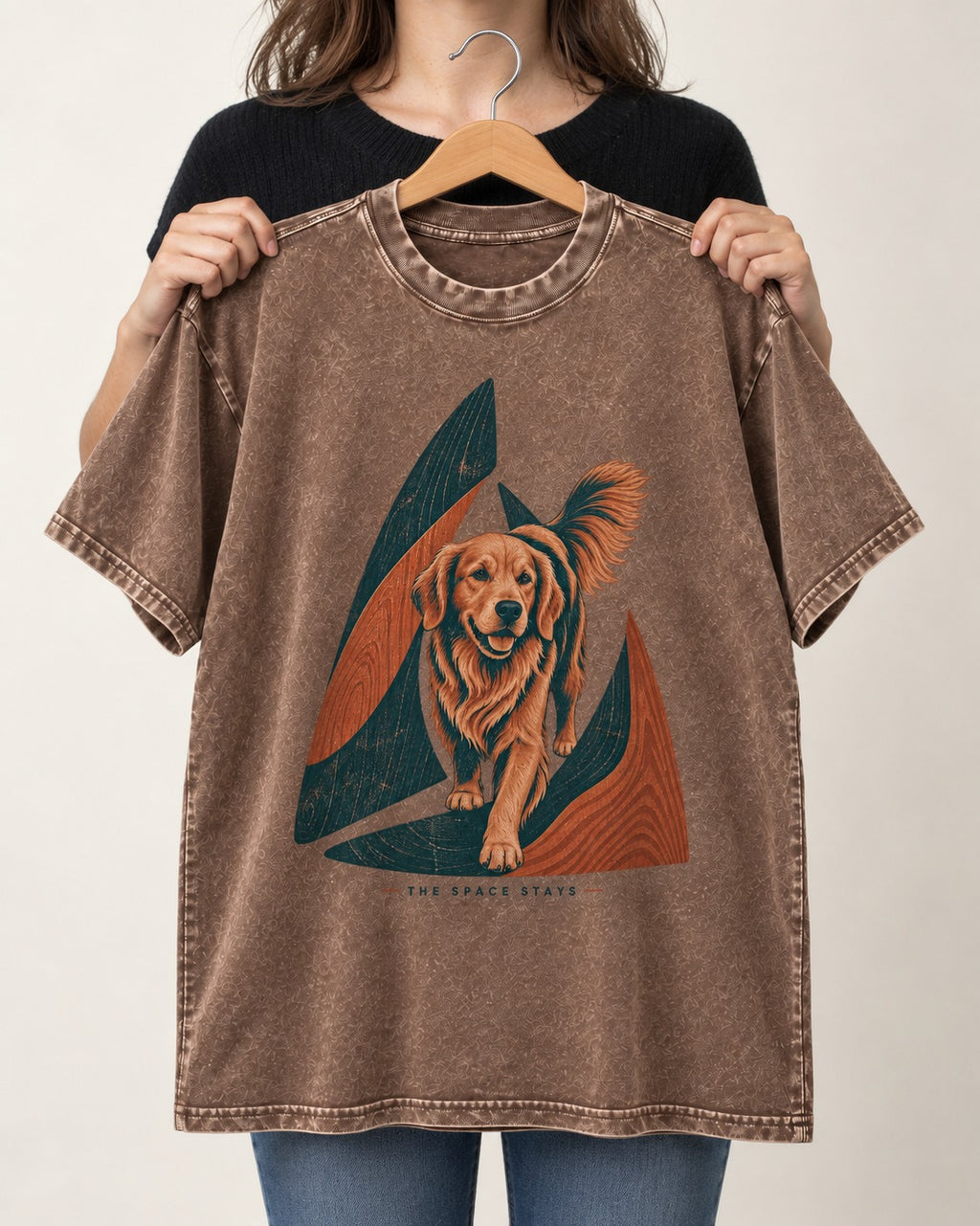 The Golden Retriever Space Stays Washed Tee in Coffee, held up on a hanger
