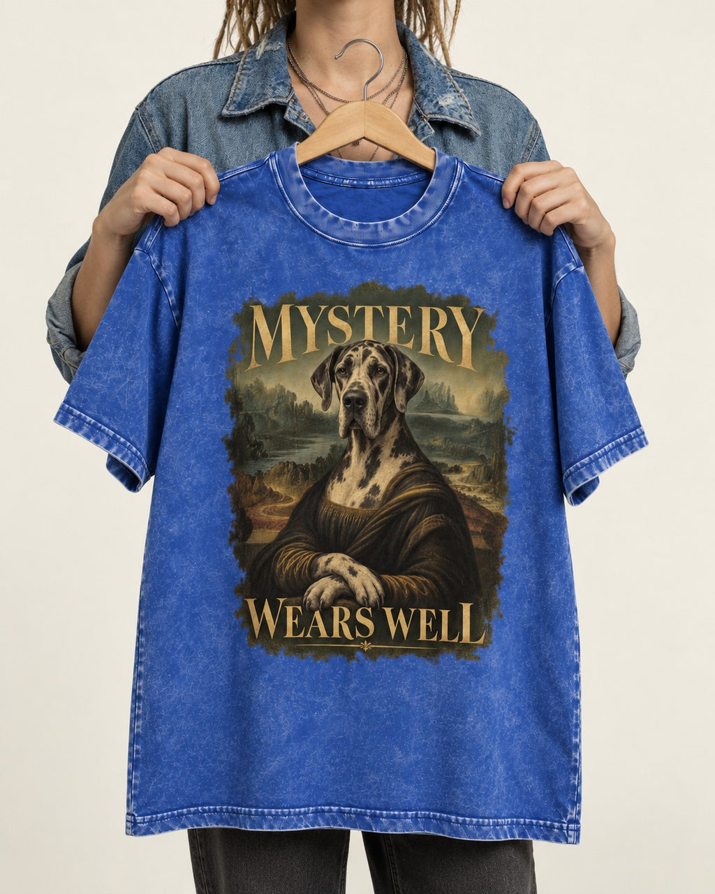 Great Dane Mystery Wears Well Renaissance Portrait Graphic Washed Tee in Royal Blue, held up on a hanger