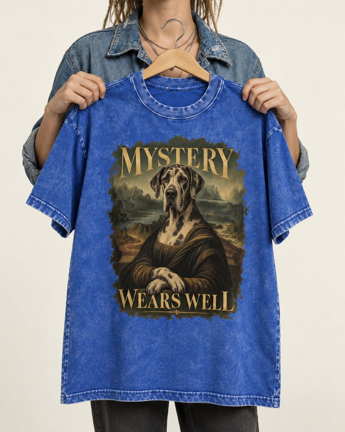 Great Dane Mystery Wears Well Renaissance Portrait Graphic Washed Tee in Royal Blue, held up on a hanger