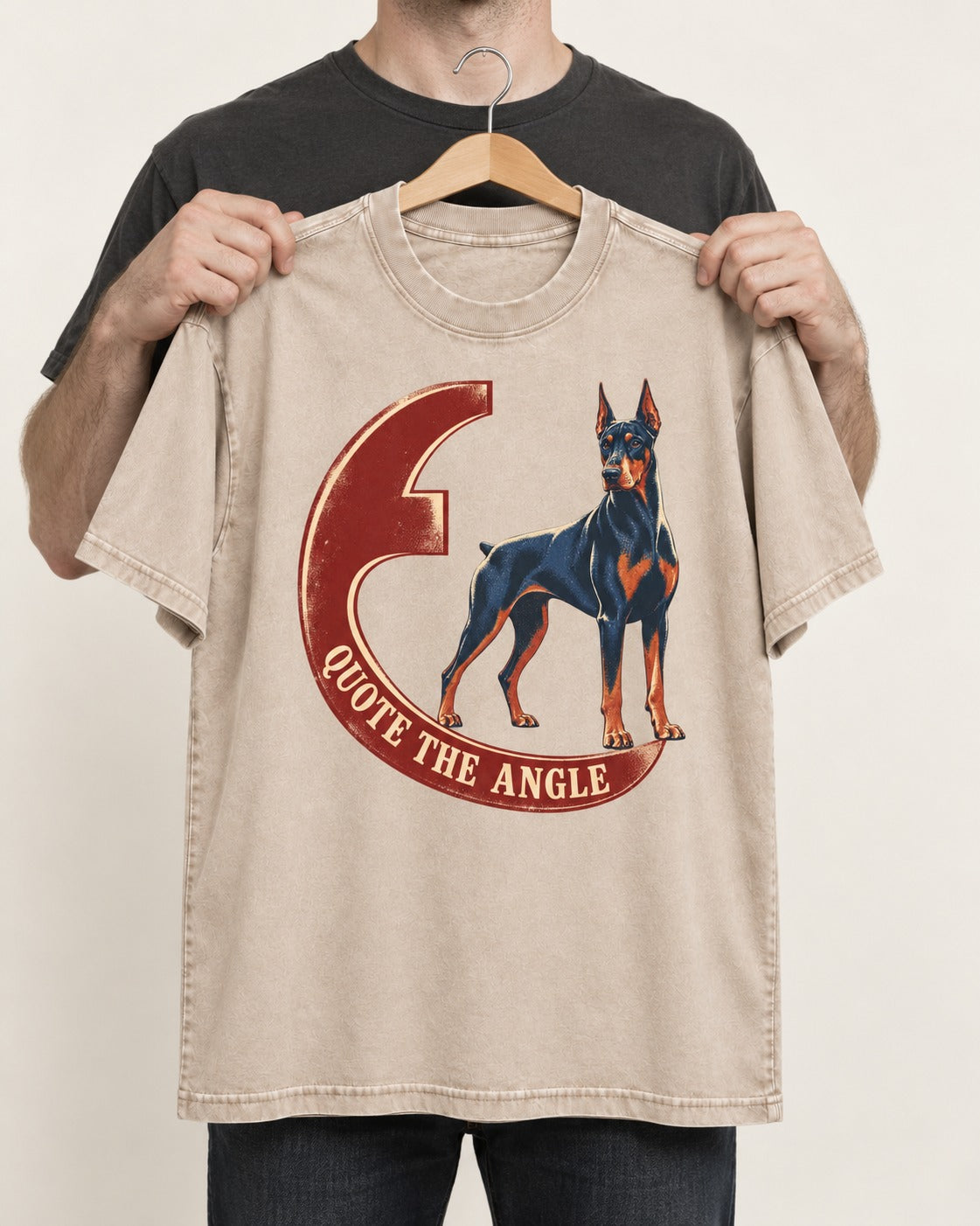 Doberman Quote the Angle Crescent Graphic Washed Tee in Apricot, held up on a hanger