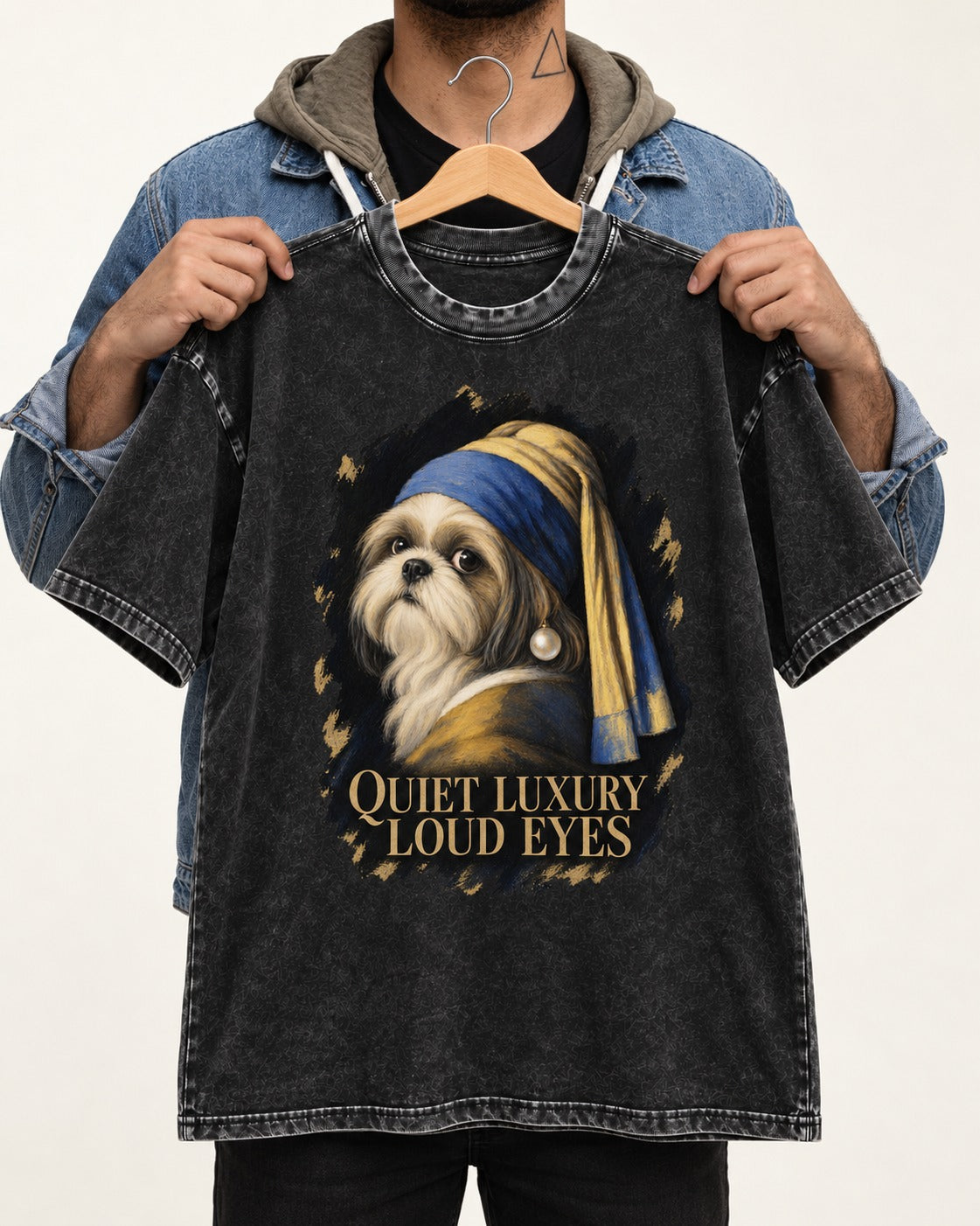 Shih Tzu Quiet Luxury Loud Eyes Pearl Portrait Graphic Washed Tee in Black, held up on a hanger