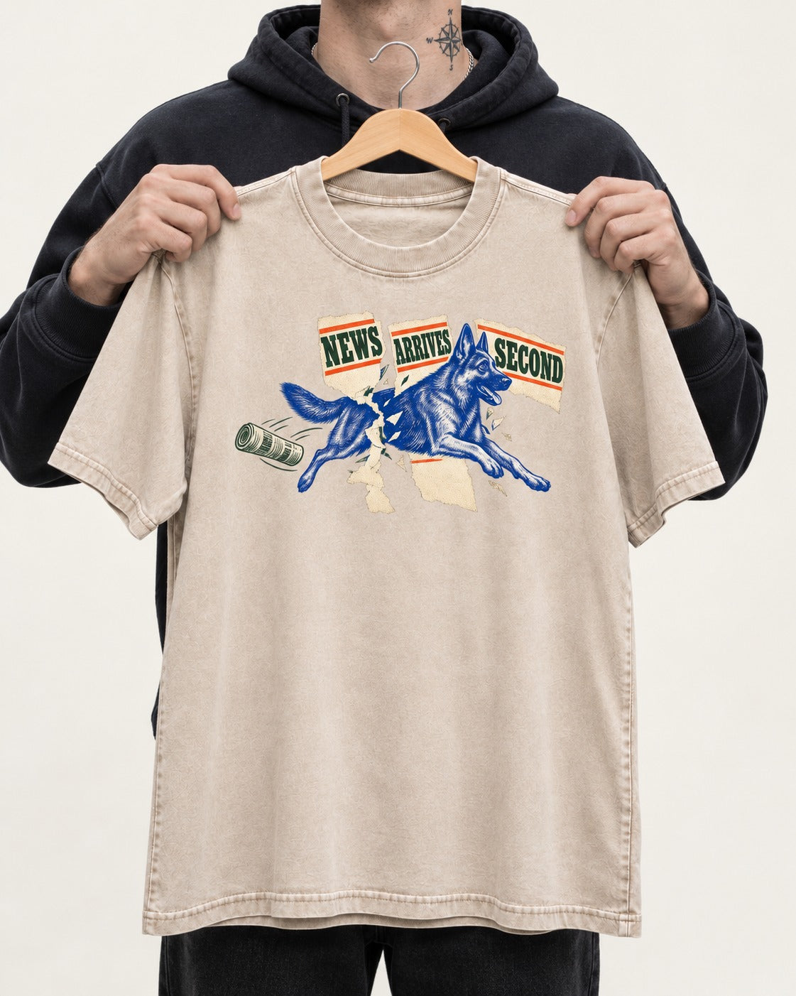 News Arrives Second German Shepherd Dog Washed Tee in Apricot, held up on a hanger