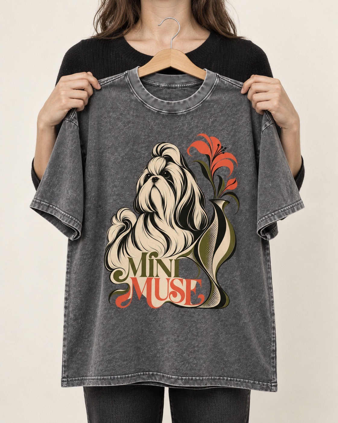 Shih Tzu Mini Muse Washed Tee in Gray, held up on a hanger
