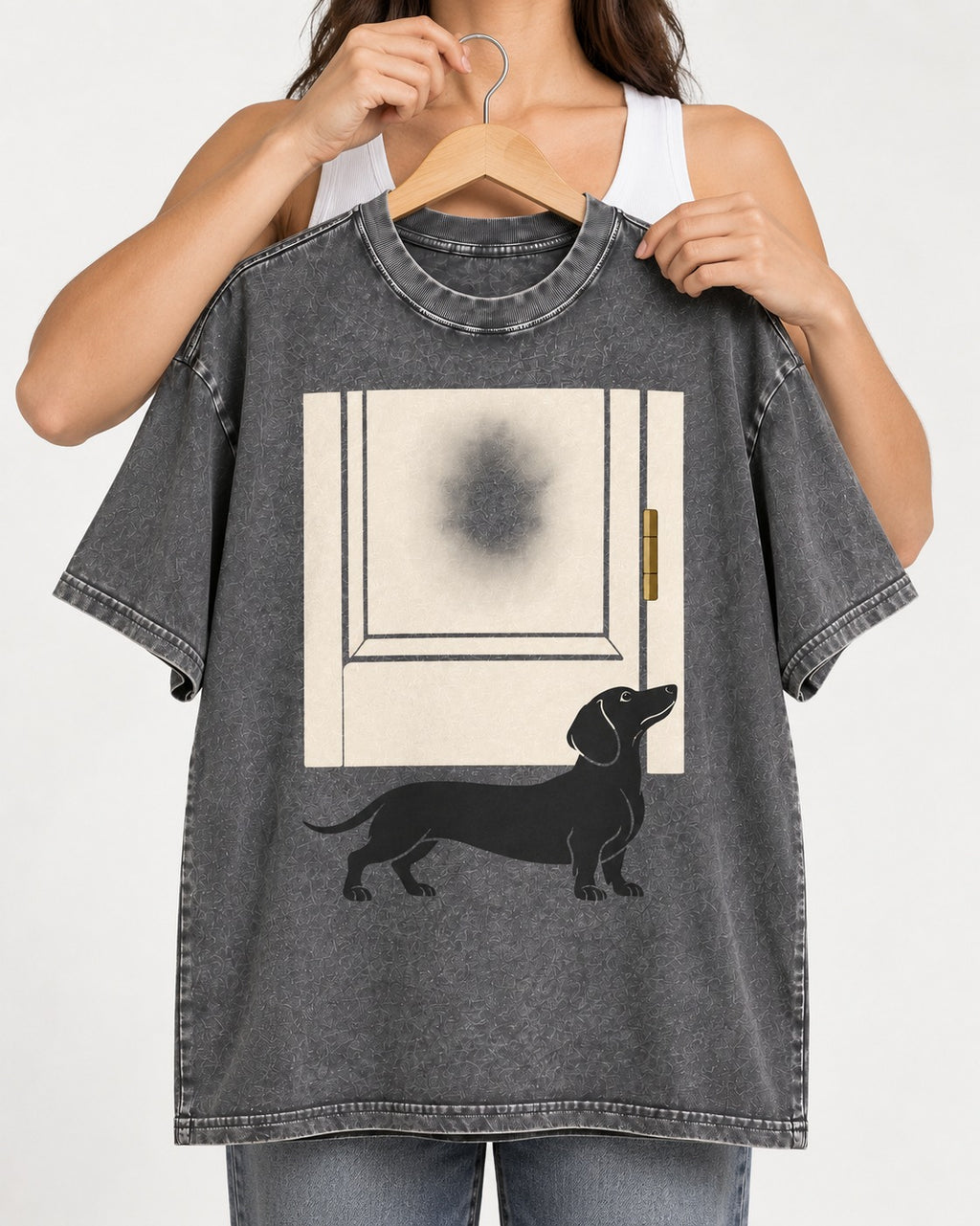 Dachshund Frosted Door Sentinel Graphic Washed Tee in Gray, held up on a hanger