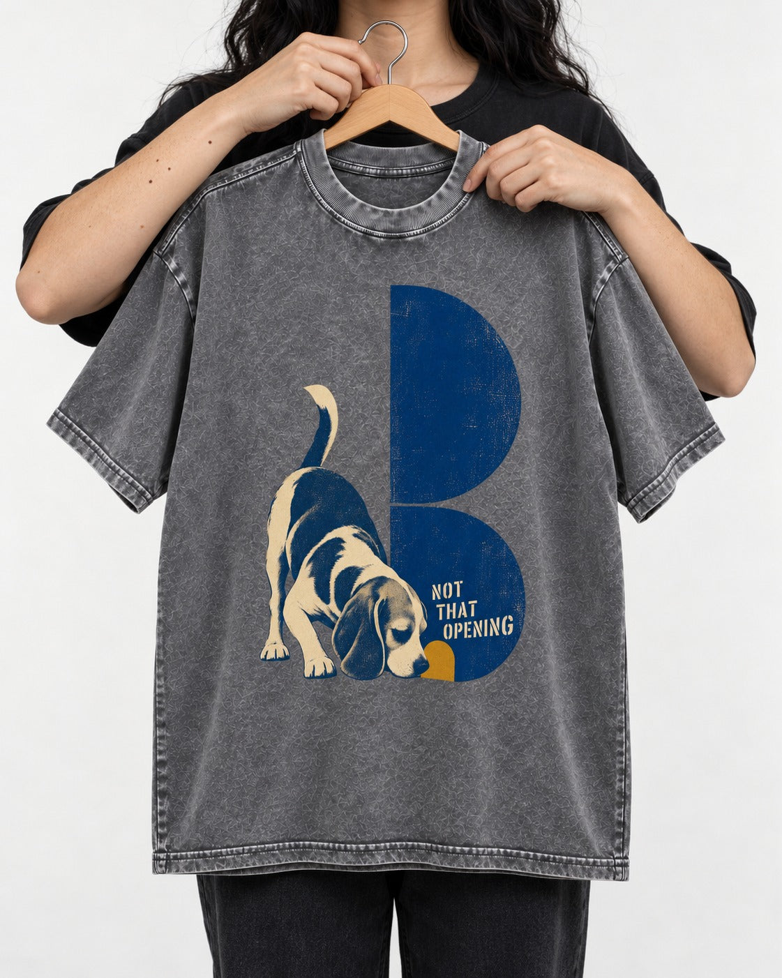 Not That Opening Beagle Washed Tee in Gray, held up on a hanger