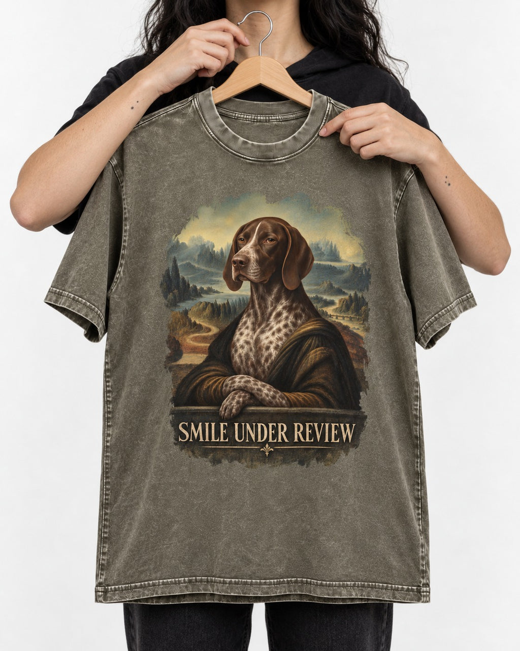 German Shorthaired Pointer Smile Under Review Renaissance Portrait Graphic Washed Tee in Army Green, held up on a hanger