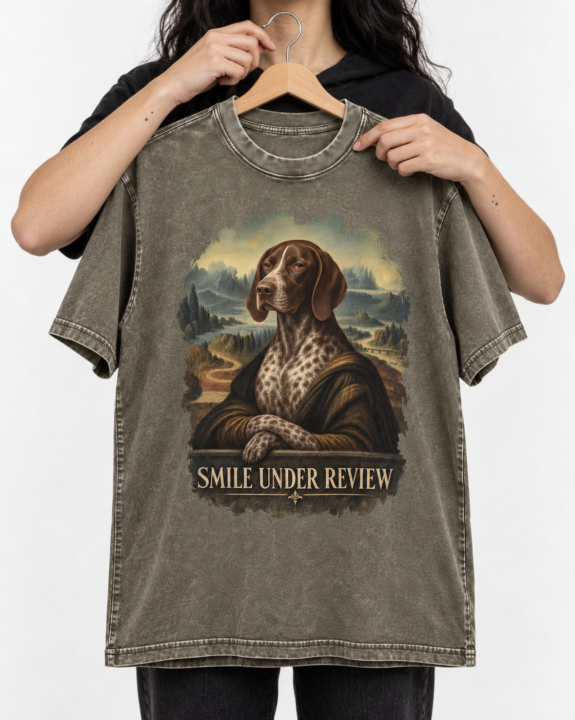 German Shorthaired Pointer Smile Under Review Renaissance Portrait Graphic Washed Tee in Army Green, held up on a hanger