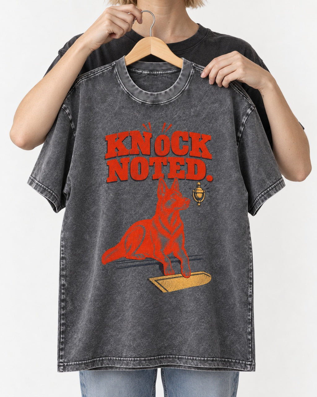 Knock Noted Door Knocker German Shepherd Dog Graphic Washed Tee in Gray, held up on a hanger