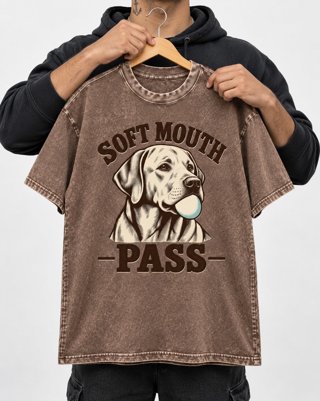 Soft Mouth Pass Labrador Retriever Washed Tee in Coffee, held up on a hanger