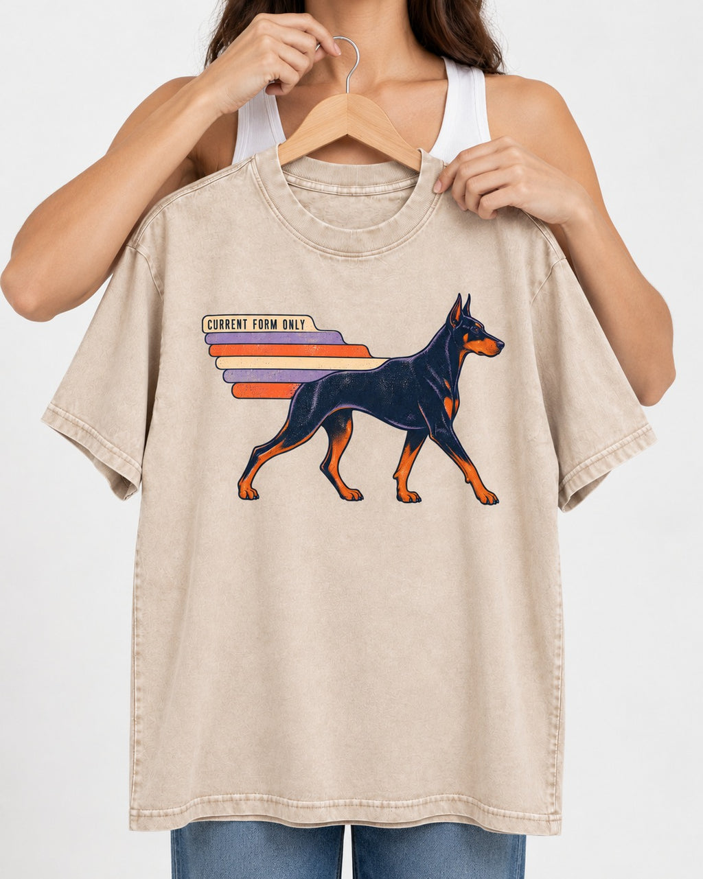 Doberman Current Form Only Speed Bars Graphic Washed Tee in Apricot, held up on a hanger
