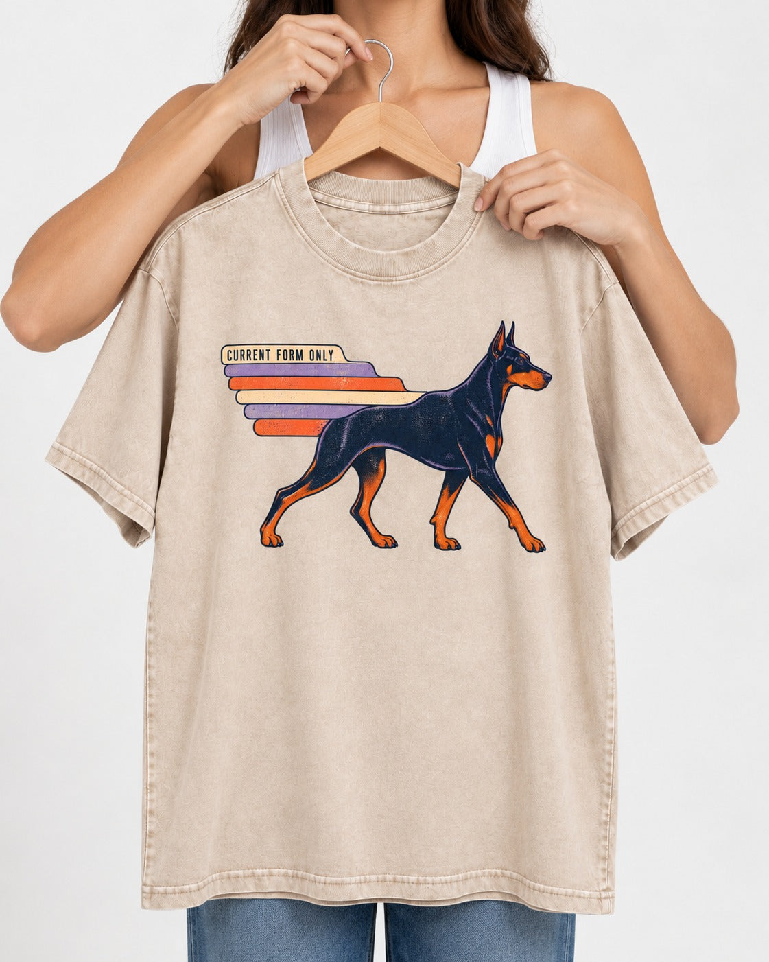 Doberman Current Form Only Speed Bars Graphic Washed Tee in Apricot, held up on a hanger