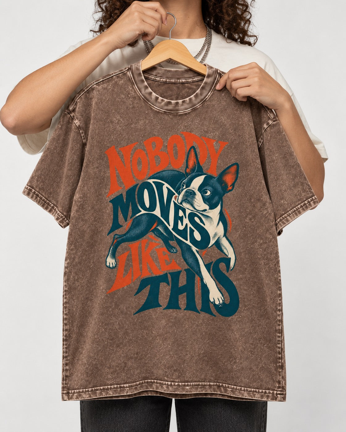 Nobody Moves Like This Boston Terrier Washed Tee in Coffee, held up on a hanger