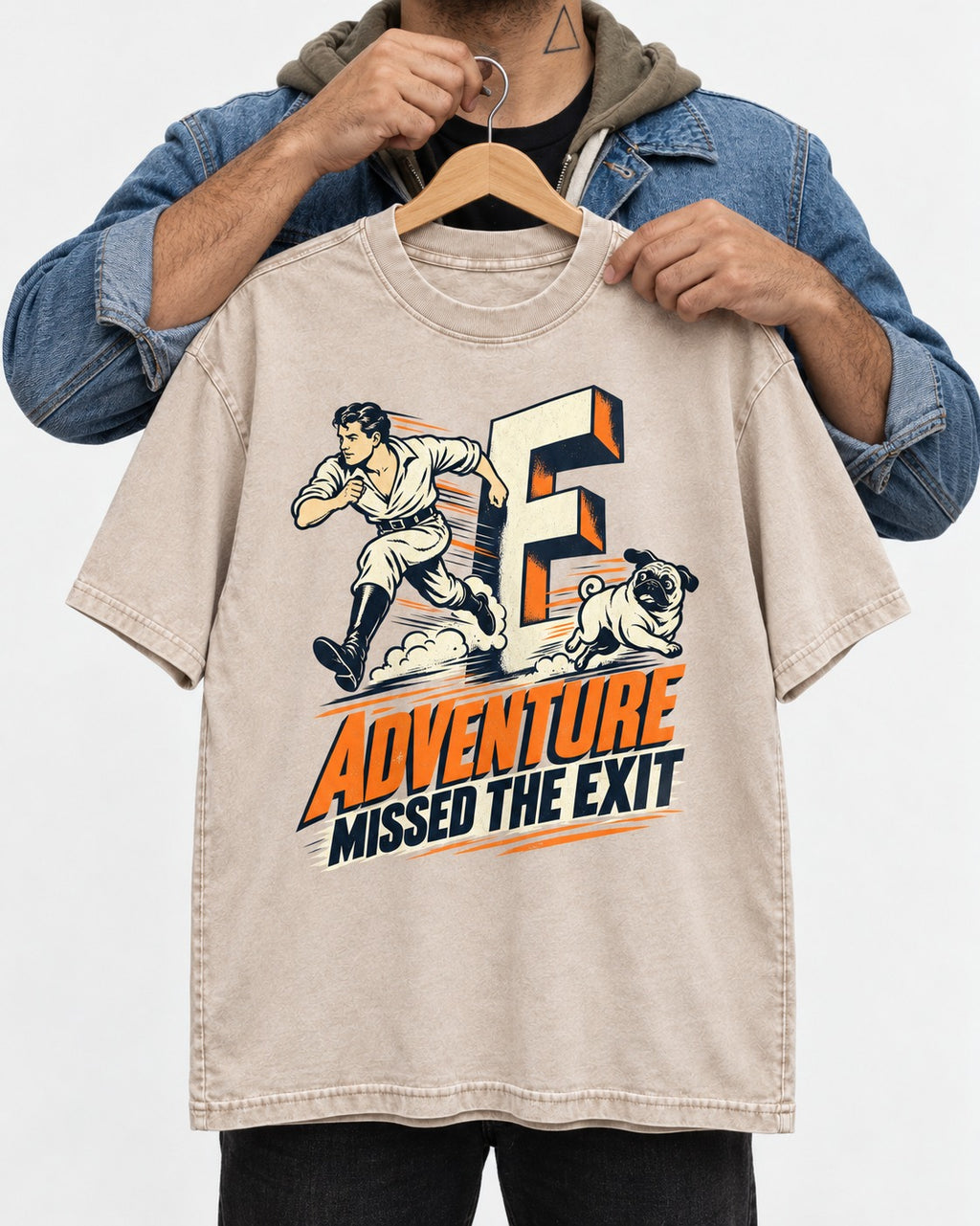 Pug Adventure Missed the Exit Running Graphic Washed Tee in Apricot, held up on a hanger