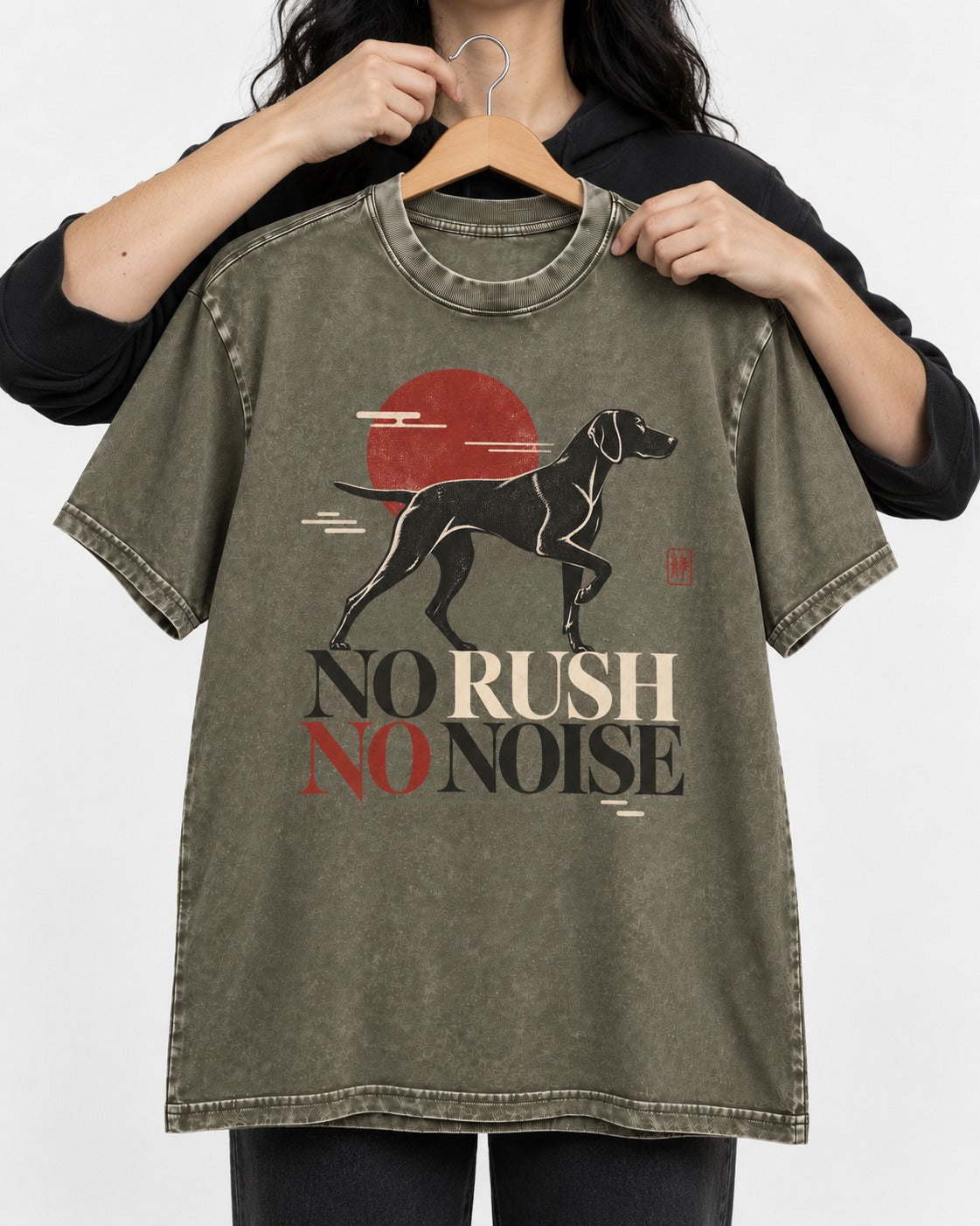 German Shorthaired Pointer No Rush No Noise Sunset Graphic Washed Tee in Army Green, held up on a hanger