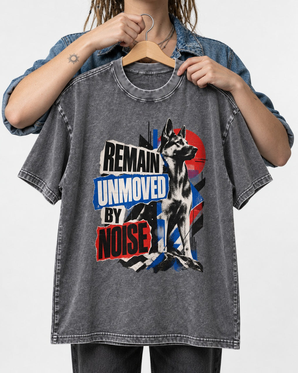 Remain Unmoved By Noise Brutalist Collage German Shepherd Dog Graphic Washed Tee in Gray, held up on a hanger