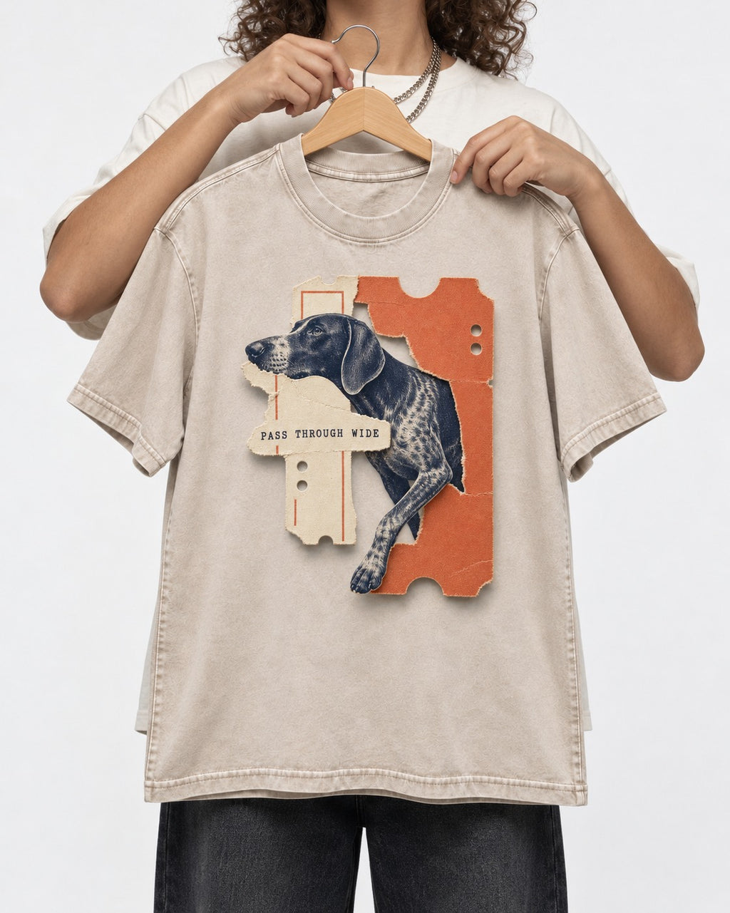 German Shorthaired Pointer Pass Through Wide Ticket Graphic Washed Tee in Apricot, held up on a hanger