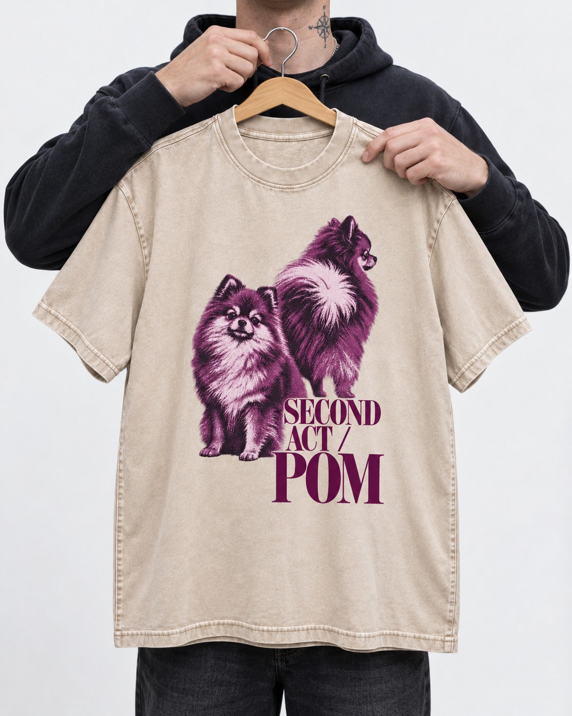 Second Act Pomeranian Washed Tee in Apricot, held up on a hanger