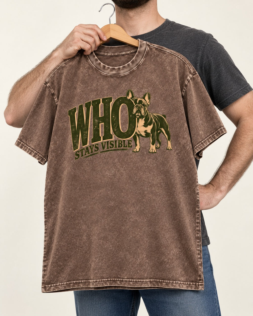 Frenchie Stays Visible Washed Tee in Coffee, held up on a hanger
