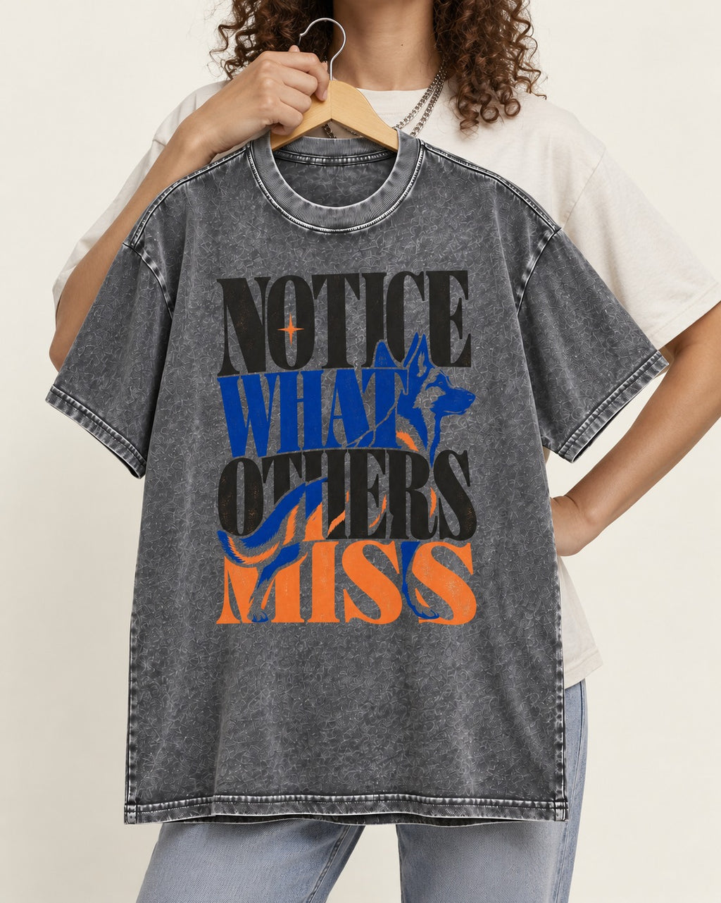 Notice What Others Miss German Shepherd Dog Washed Tee in Gray, held up on a hanger