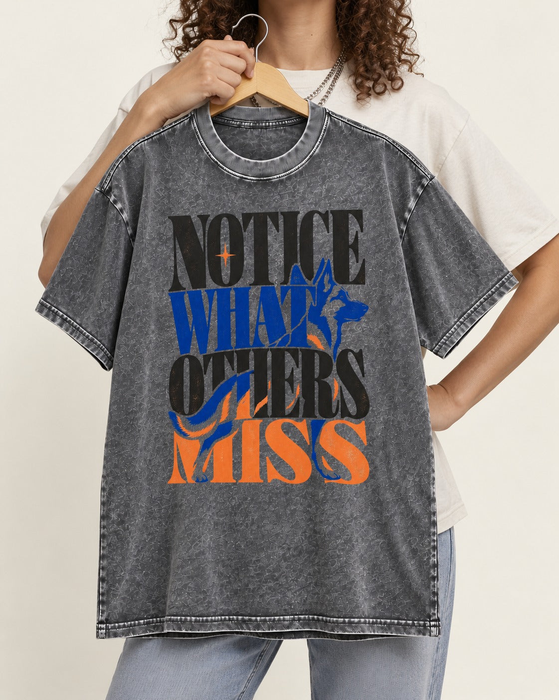 Notice What Others Miss German Shepherd Dog Washed Tee in Gray, held up on a hanger