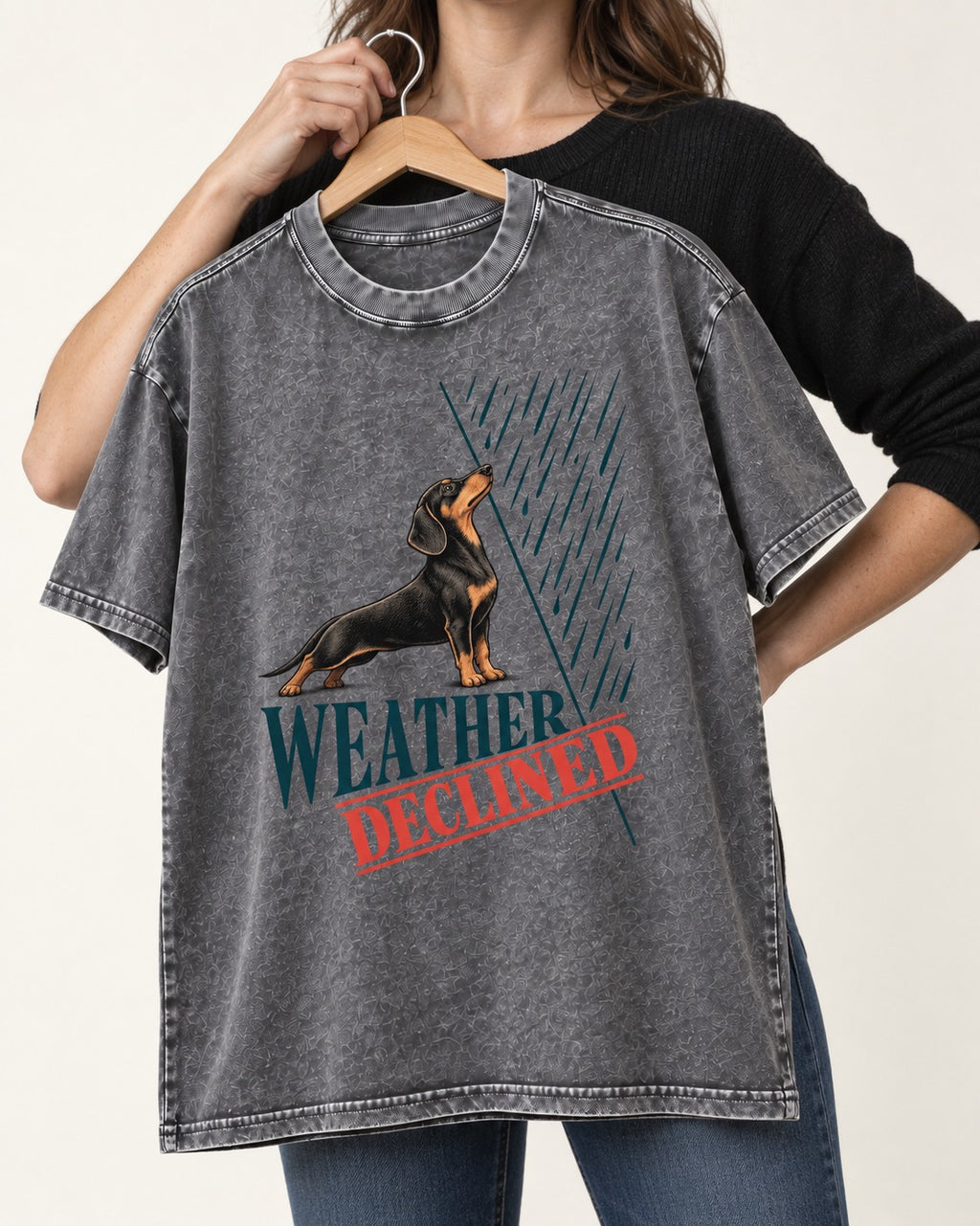 Weather Declined by Dachshund Washed Tee in Gray, held up on a hanger