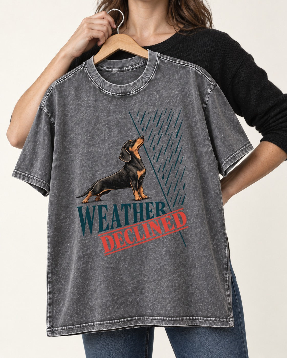 Weather Declined by Dachshund Washed Tee in Gray, held up on a hanger