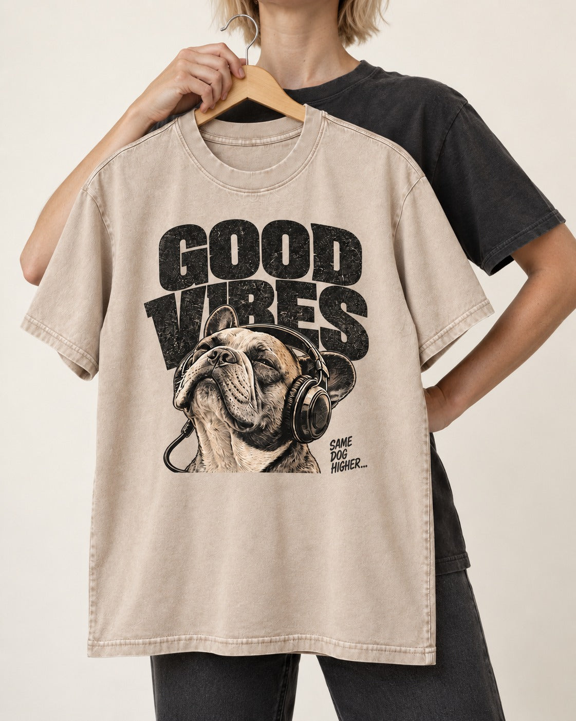 Frenchie Good Vibes Washed Tee in Apricot, held up on a hanger