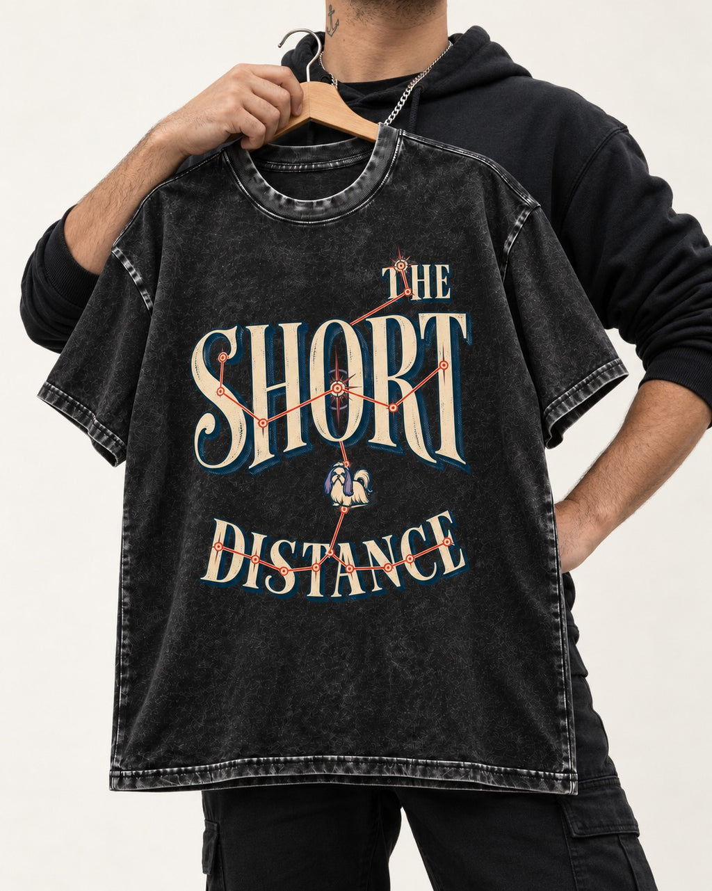 Shih Tzu The Short Distance Route Graphic Washed Tee in Black, held up on a hanger