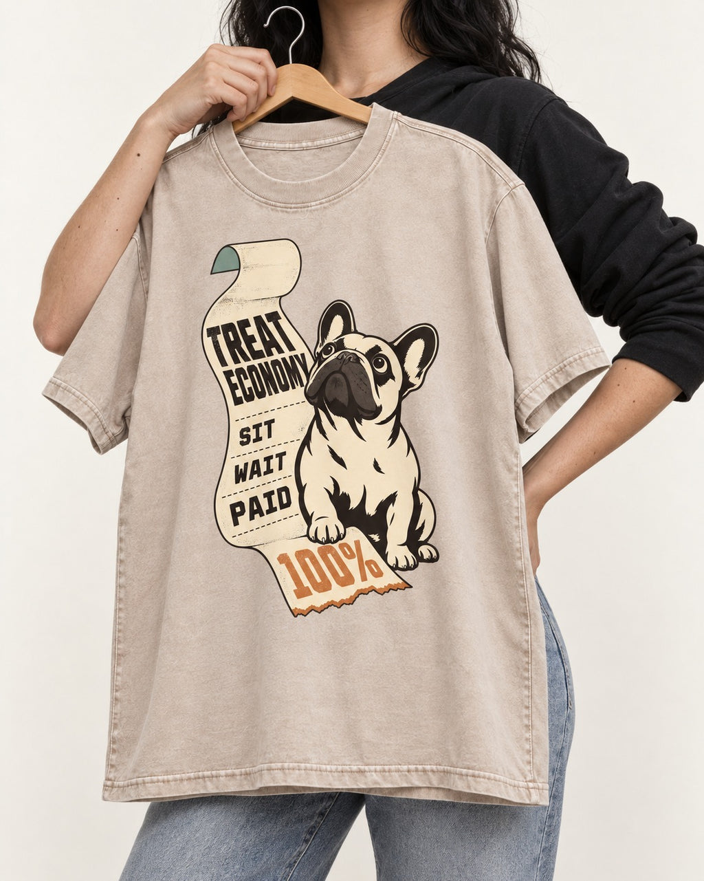 Frenchie Treat Economy Sit Wait Paid Receipt Graphic Washed Tee in Apricot, held up on a hanger