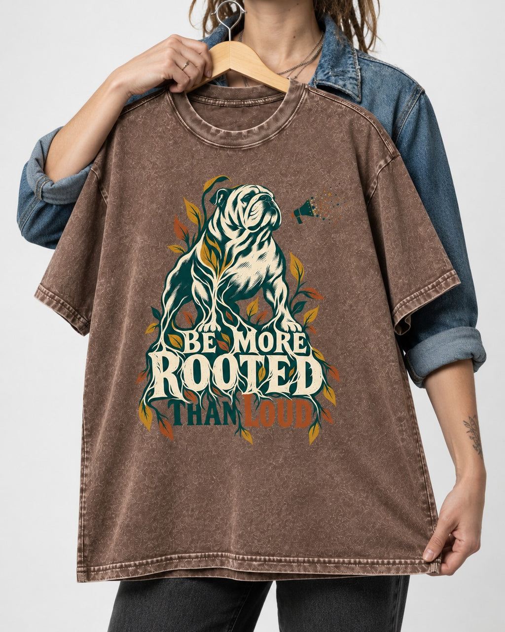 More Rooted Than Loud English Bulldog Washed Tee in Coffee, held up on a hanger