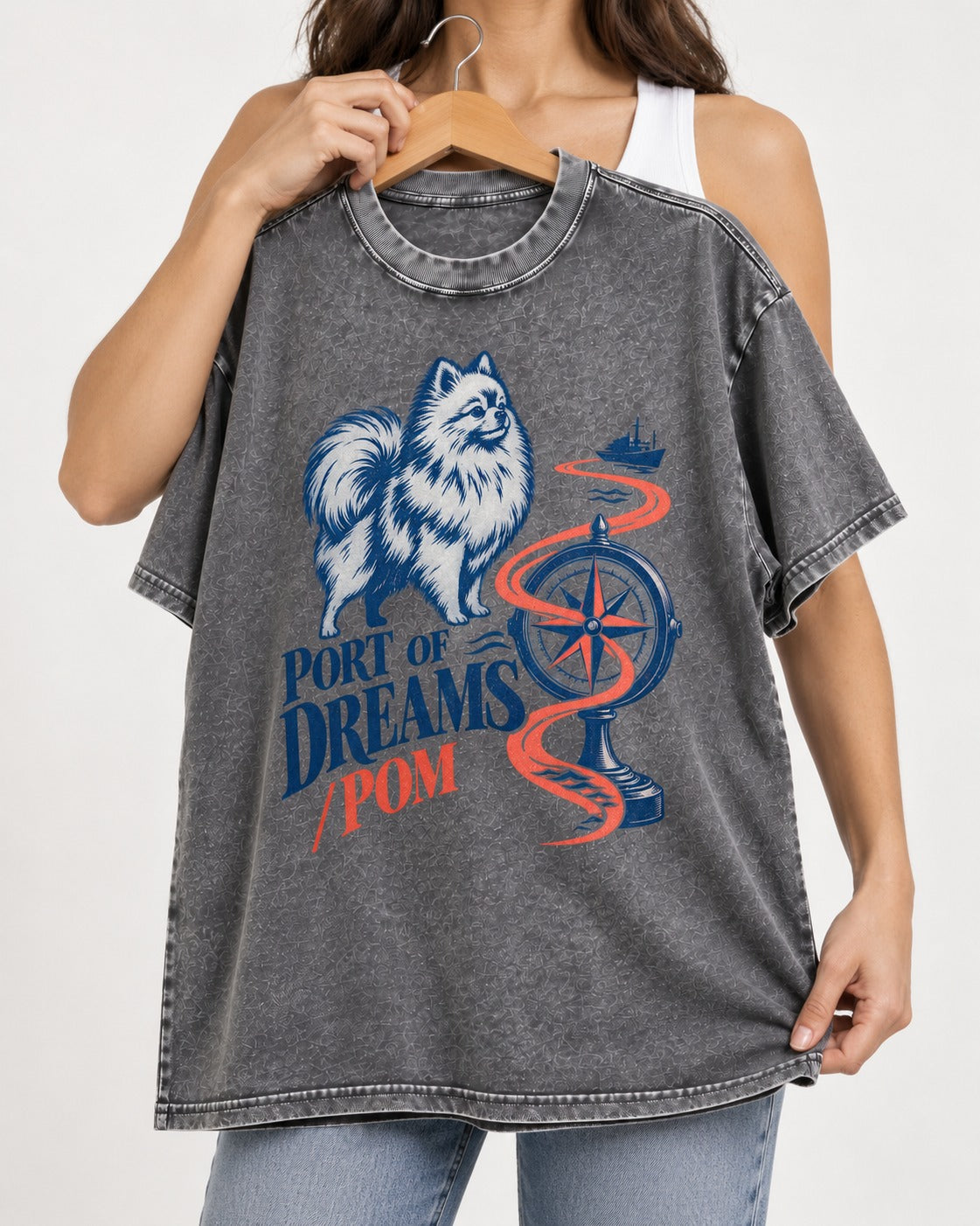 Pomeranian Port of Dreams Washed Tee in Gray, held up on a hanger