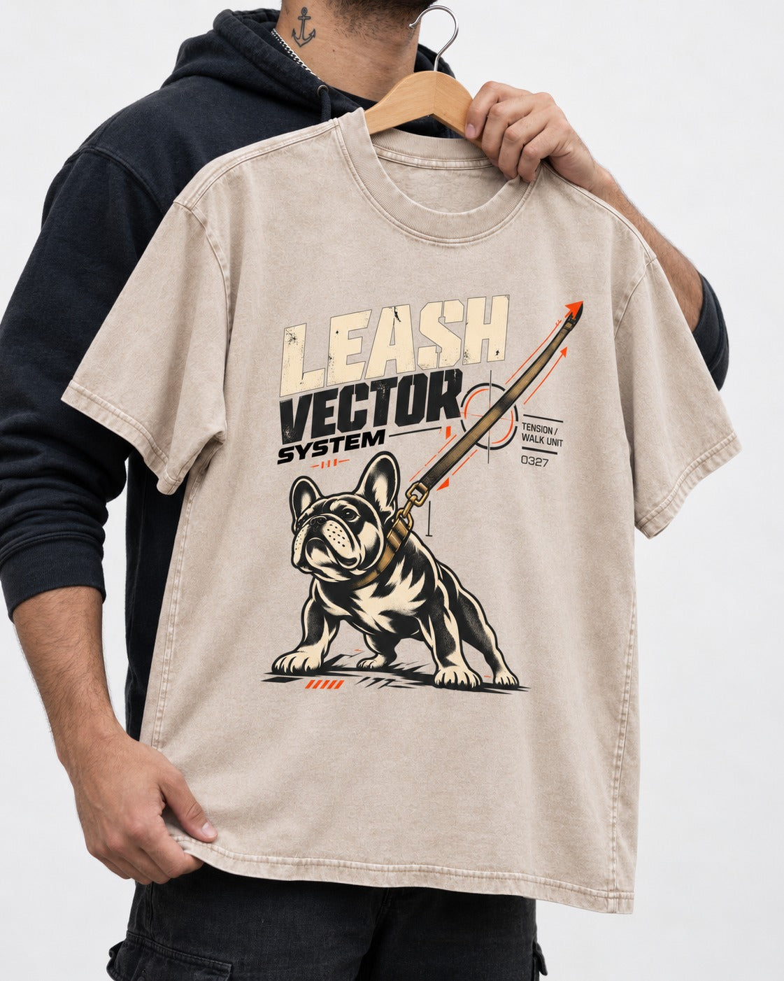 Frenchie Leash Vector Washed Tee in Apricot, held up on a hanger