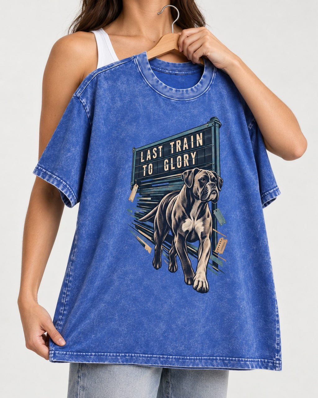Last Train to Glory Boxer Washed Tee in Royal Blue, held up on a hanger