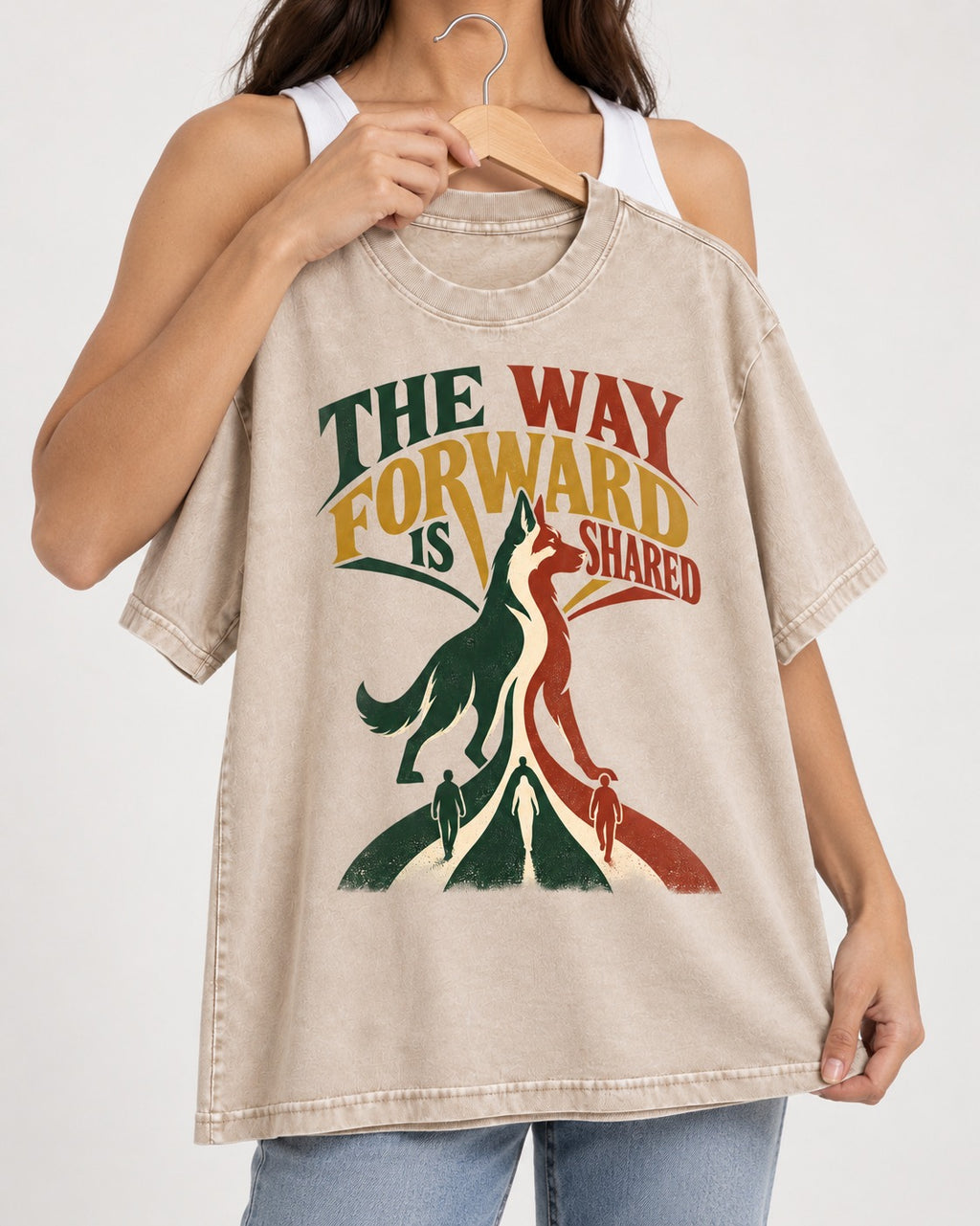 Shared Way Forward German Shepherd Dog Washed Tee in Apricot, held up on a hanger