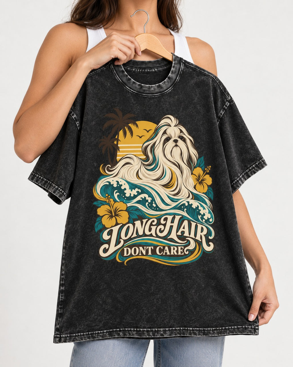 Shih Tzu Long Hair Don't Care Tropical Wave Graphic Washed Tee in Black, held up on a hanger