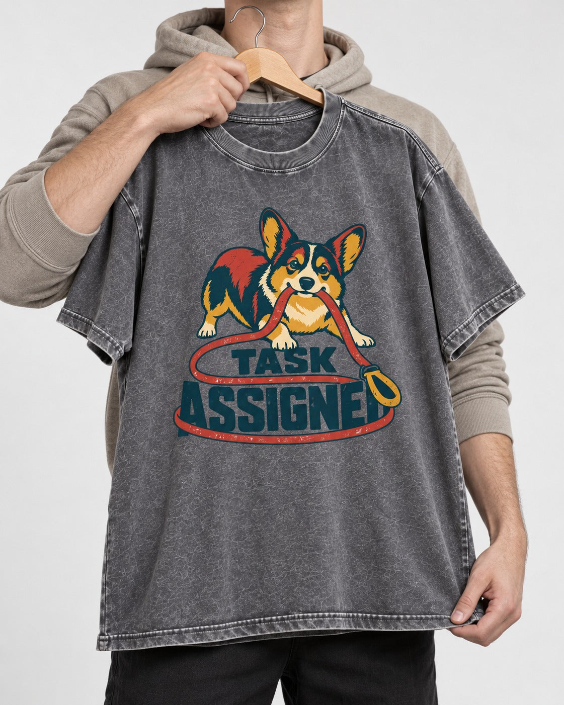 Corgi Task Assigned Washed Tee in Gray, held up on a hanger