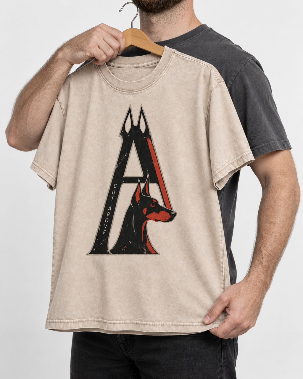 Doberman A Cut Above Washed Tee in Apricot, held up on a hanger