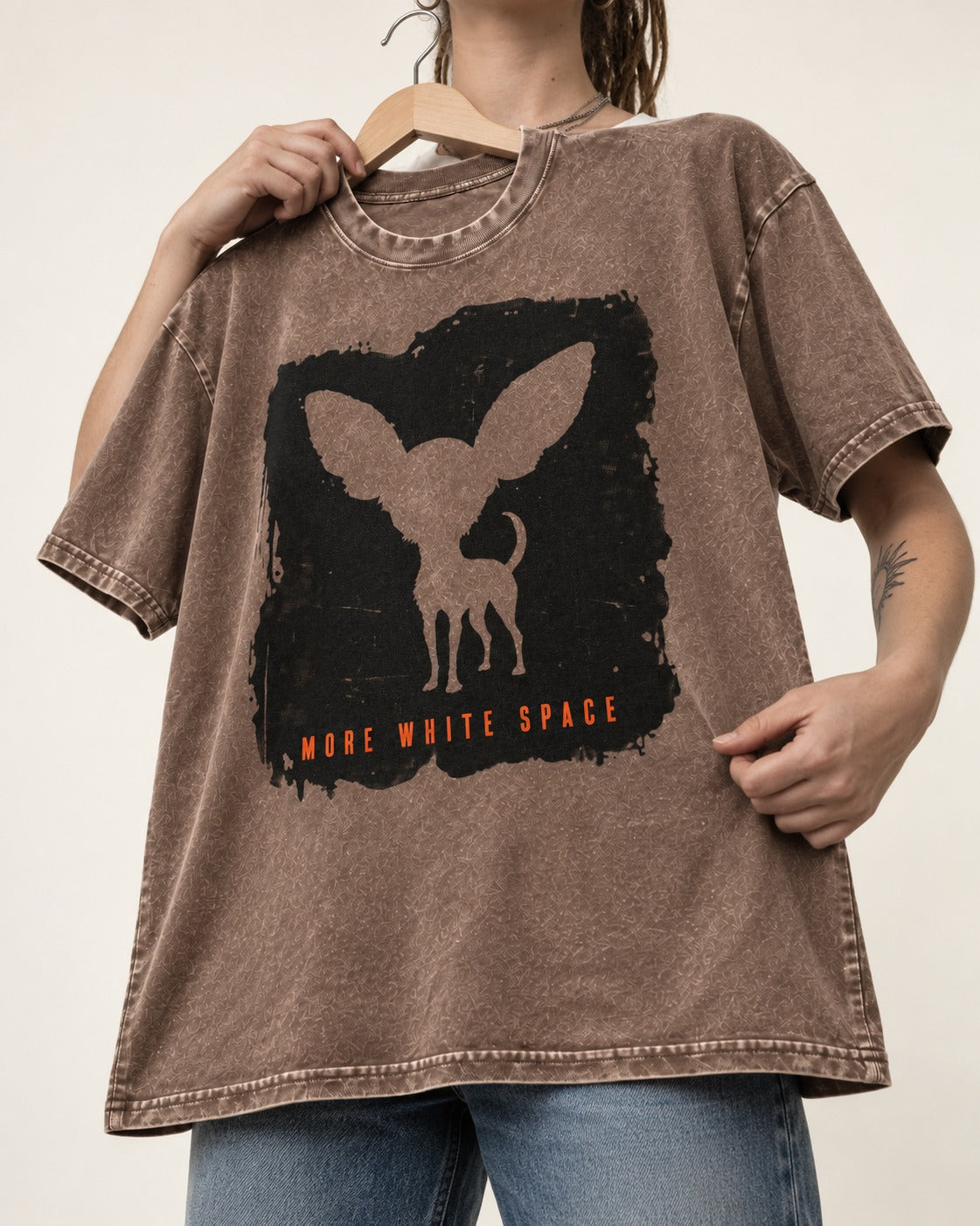 More White Space Chihuahua Washed Tee in Coffee, held up on a hanger