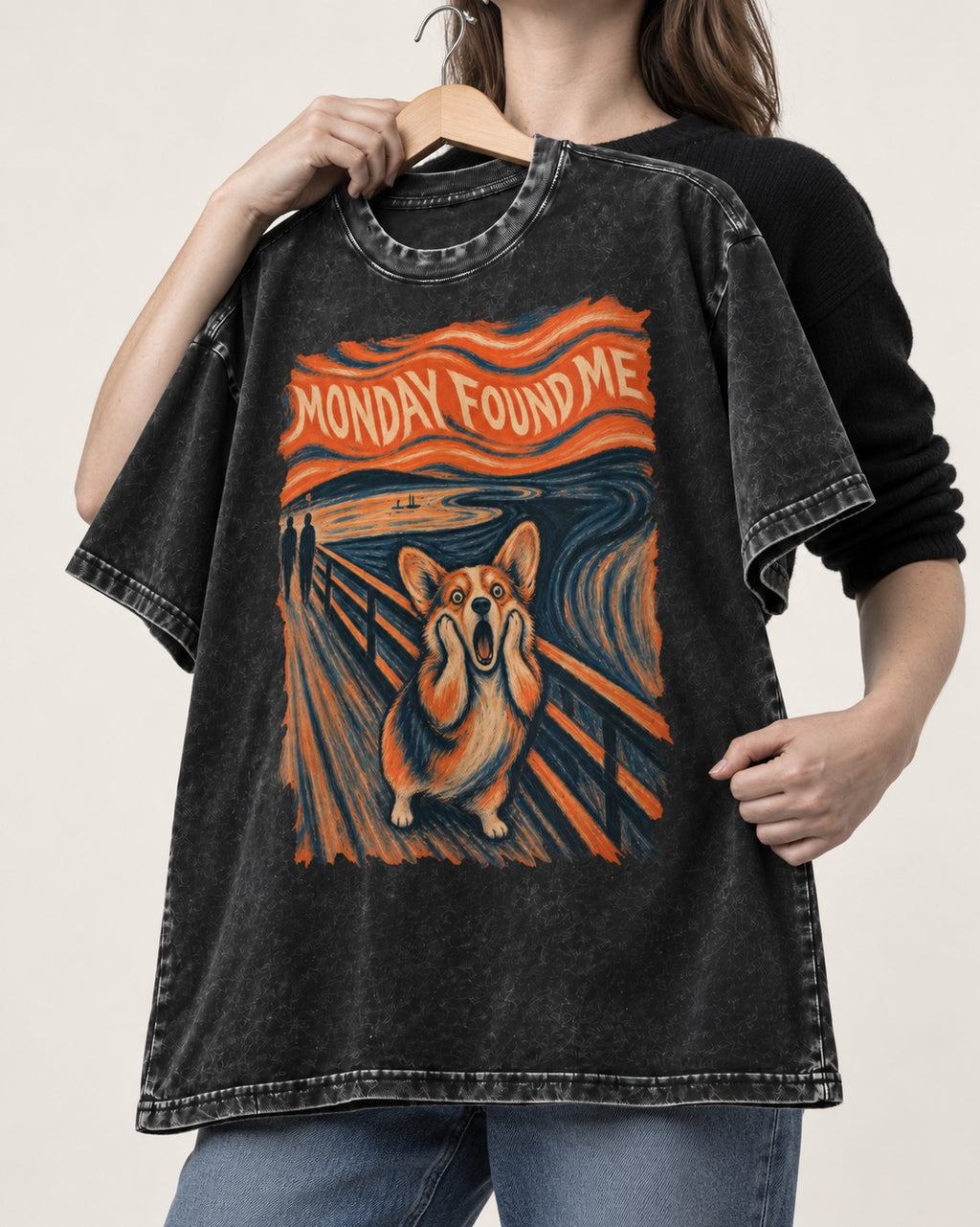 Corgi Monday Found Me Scream Banner Washed Tee in Black, held up on a hanger