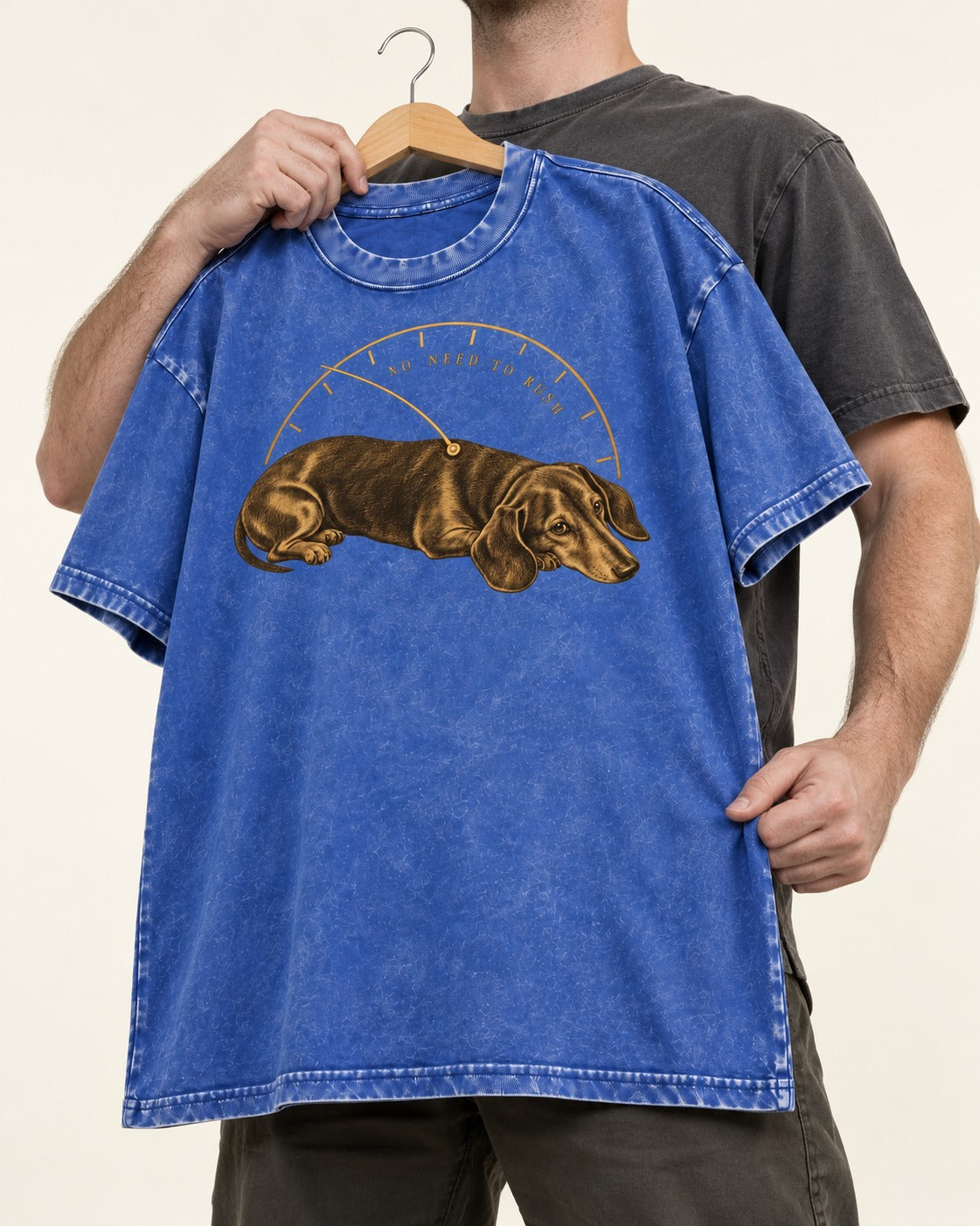 Dachshund No Need To Rush Gauge Graphic Washed Tee in Royal Blue, held up on a hanger