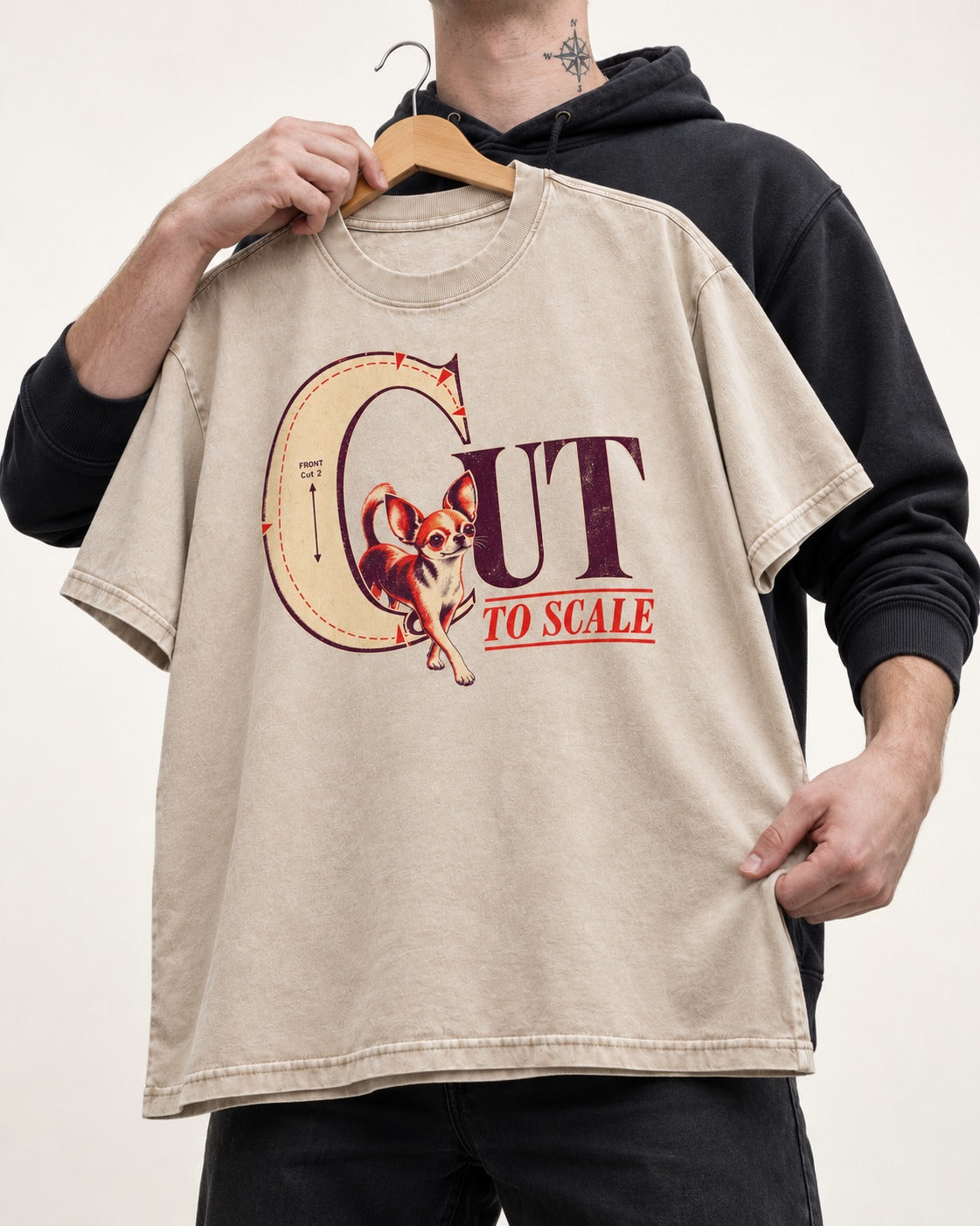 Chihuahua Cut to Scale Sewing Pattern Graphic Washed Tee in Apricot, held up on a hanger