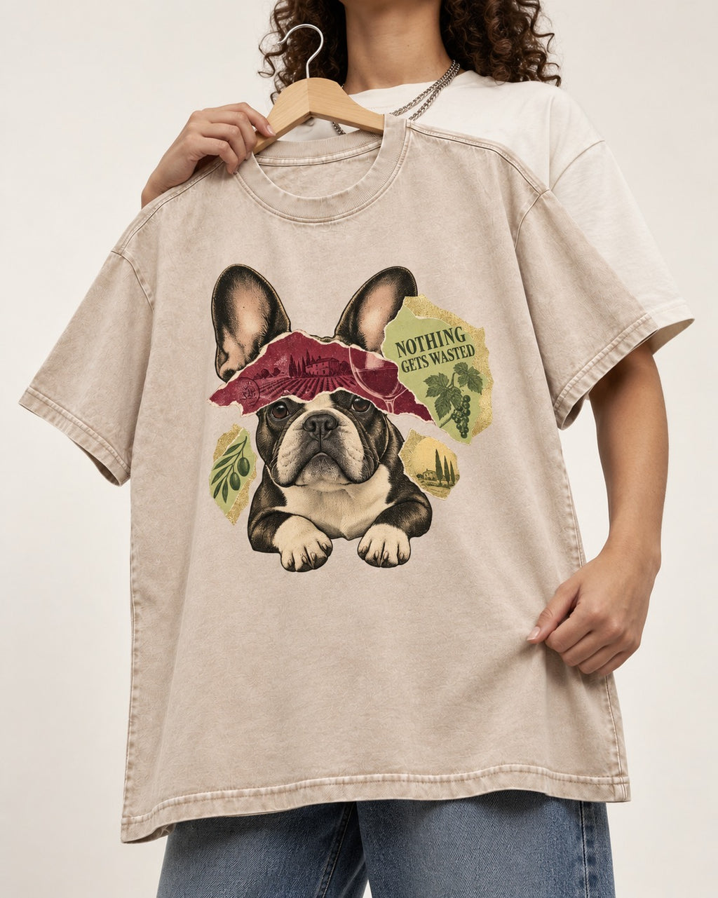 Nothing Gets Wasted with Frenchie Washed Tee in Apricot, held up on a hanger