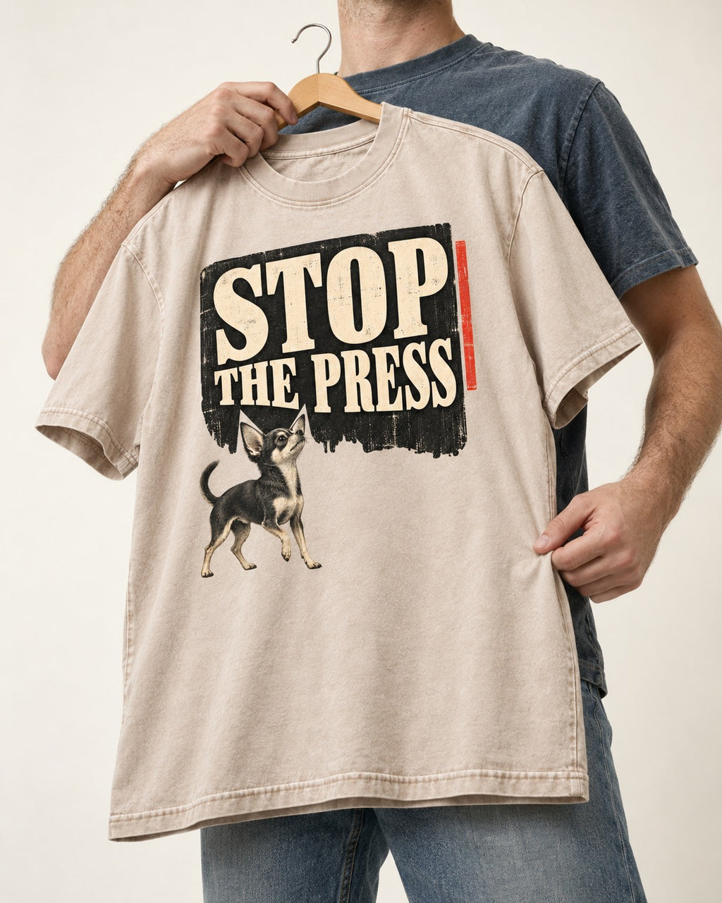 Stop the Press Chihuahua Washed Tee in Apricot, held up on a hanger